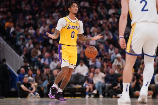 Oct 18, 2024; San Francisco, California, USA; Los Angeles Lakers guard Jalen Hood-Schifino (0) dribbles the ball up the court against the Golden State Warriors in the first quarter at the Chase Center. Mandatory Credit: Cary Edmondson-Imagn Images