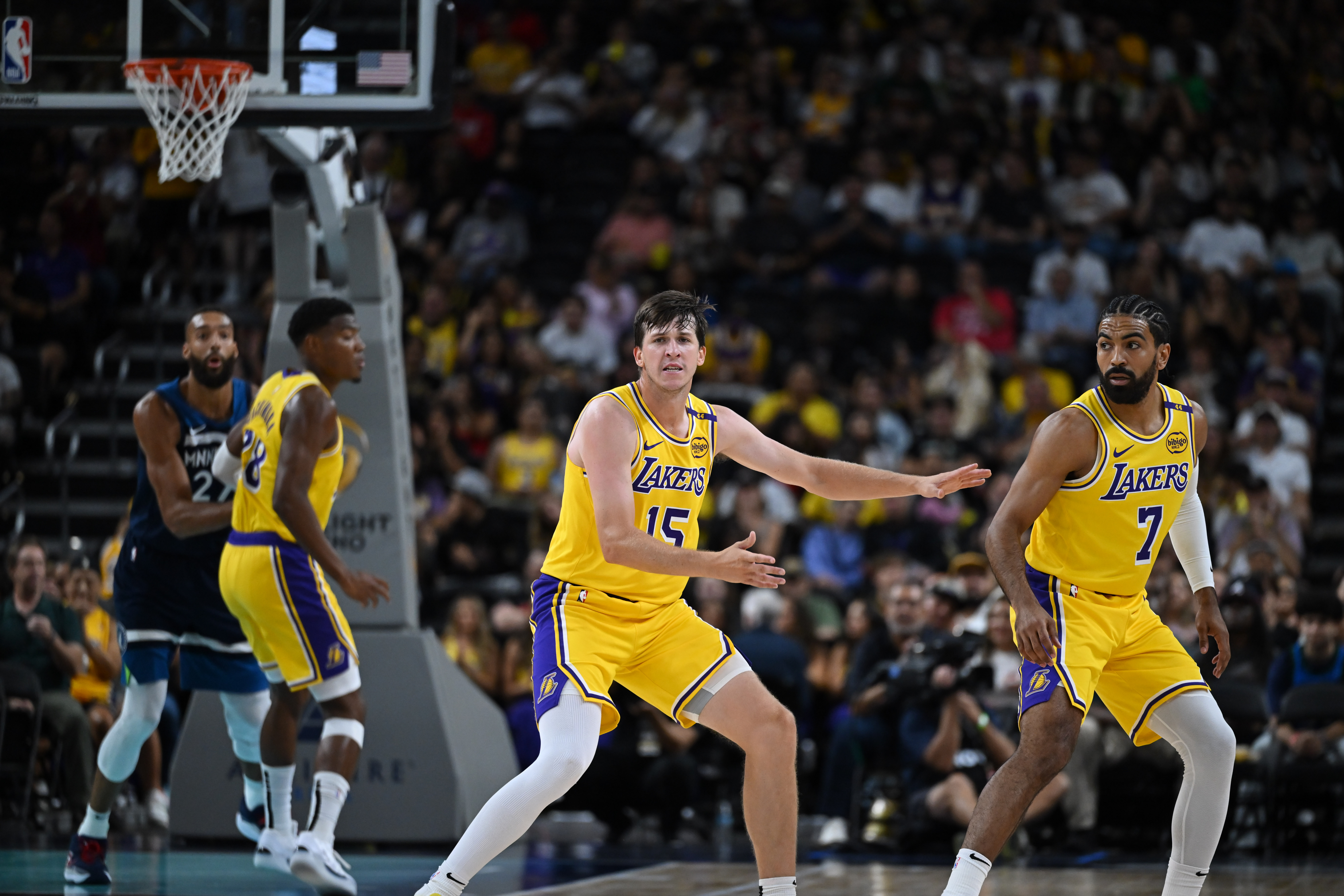 Oct 4, 2024; Palm Desert, California, USA; Los Angeles Lakers guard Austin Reaves (15) reacts against the Minnesota Timberwolves during the first half at Acrisure Arena. Mandatory Credit: Jonathan Hui-Imagn Images