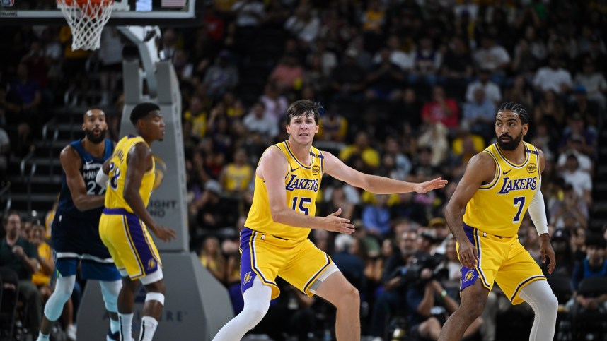 Oct 4, 2024; Palm Desert, California, USA; Los Angeles Lakers guard Austin Reaves (15) reacts against the Minnesota Timberwolves during the first half at Acrisure Arena. Mandatory Credit: Jonathan Hui-Imagn Images