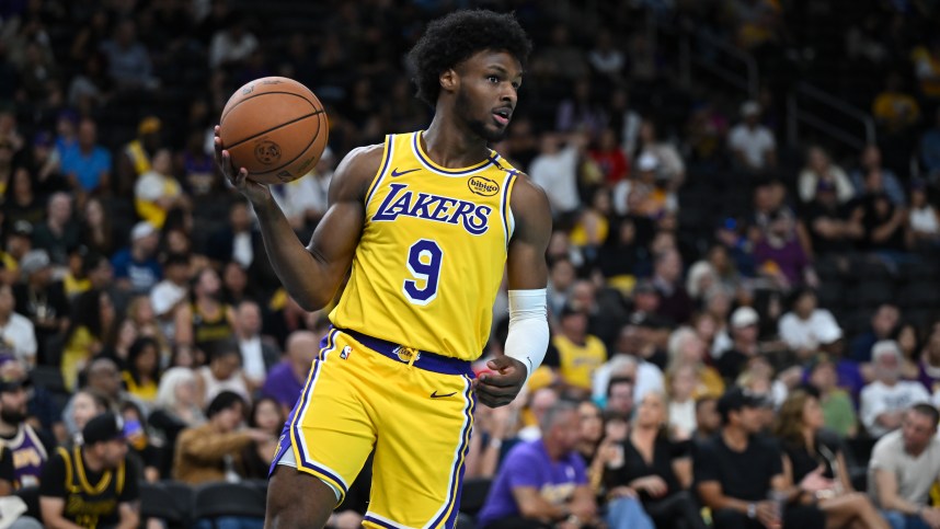 Oct 4, 2024; Palm Desert, California, USA; Los Angeles Lakers guard Bronny James (9) looks to pass against the Minnesota Timberwolves during the second half at Acrisure Arena. Mandatory Credit: Jonathan Hui-Imagn Images