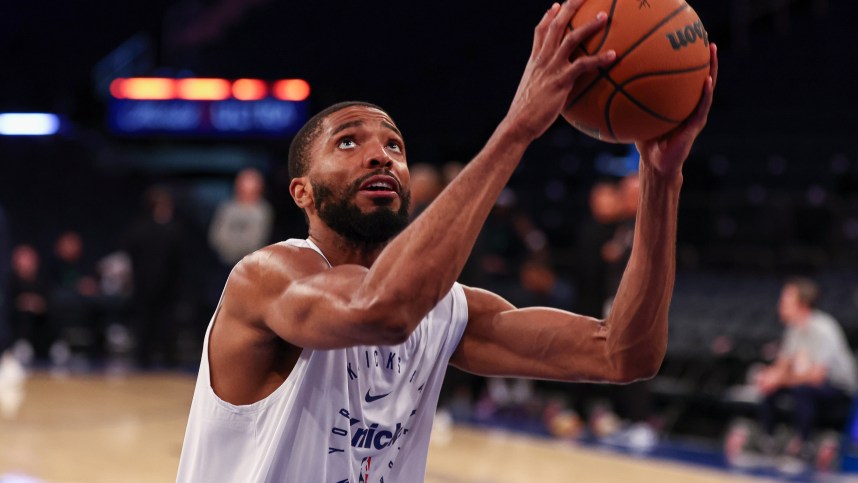 Oct 13, 2024; New York, New York, USA; New York Knicks forward Mikal Bridges (25) warms up before the game against the Minnesota Timberwolves at Madison Square Garden. Mandatory Credit: Vincent Carchietta-Imagn Images