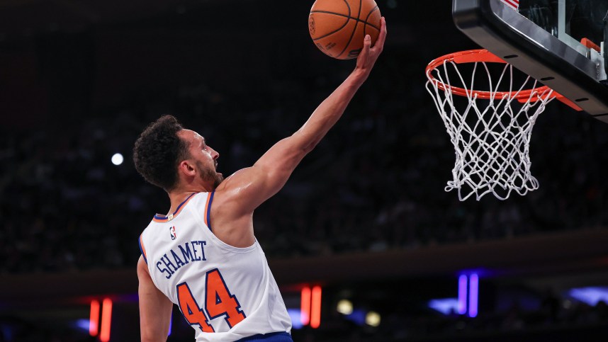 Oct 13, 2024; New York, New York, USA; New York Knicks guard Landry Shamet (44) lays the ball up for a basket  during the first half against the Minnesota Timberwolves at Madison Square Garden. Mandatory Credit: Vincent Carchietta-Imagn Images