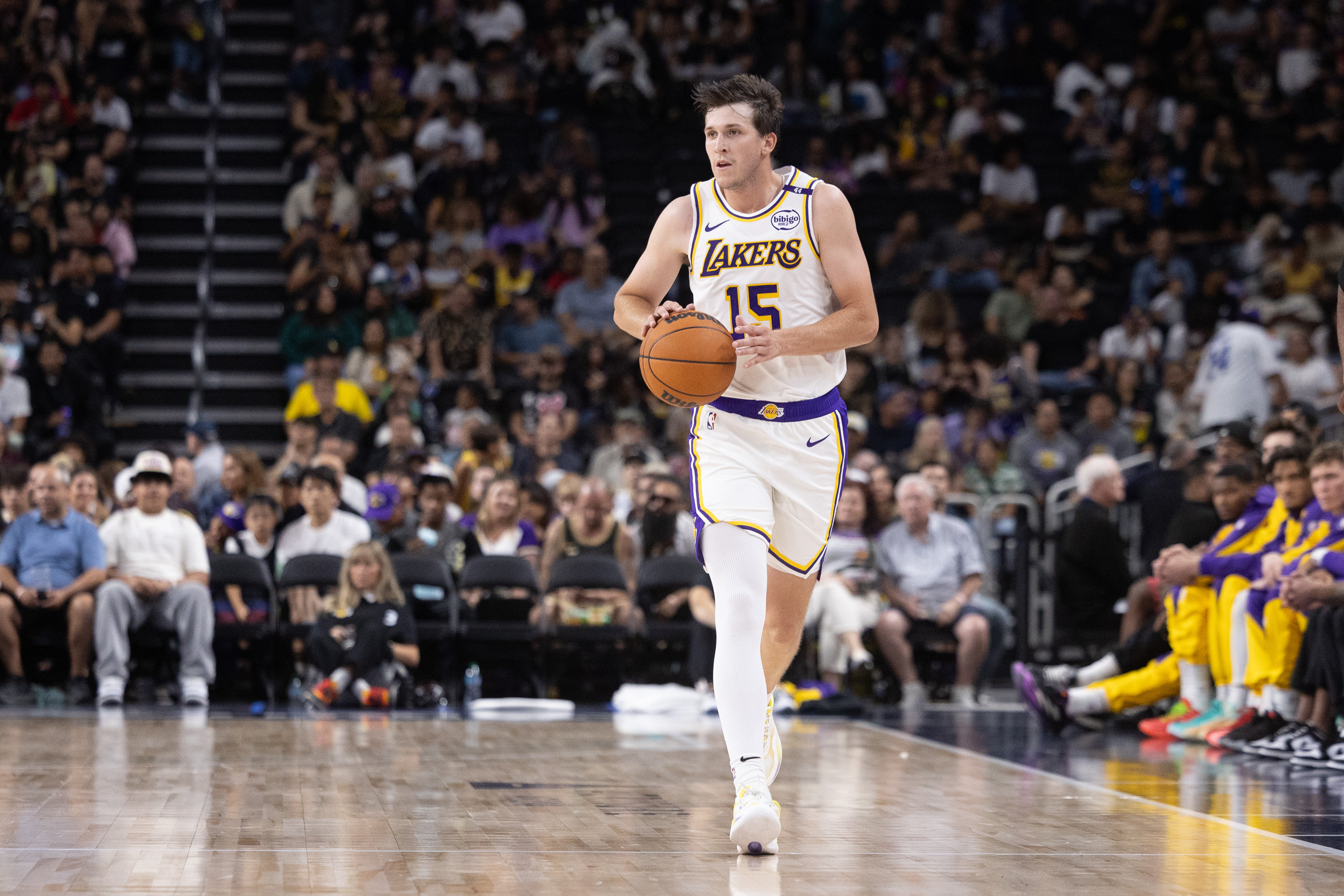 Oct 6, 2024; Palm Desert, California, USA; Los Angeles Lakers guard Austin Reaves (15) moves the ball against the Phoenix Suns during the second half  at Acrisure Arena. Mandatory Credit: David Frerker-Imagn Images