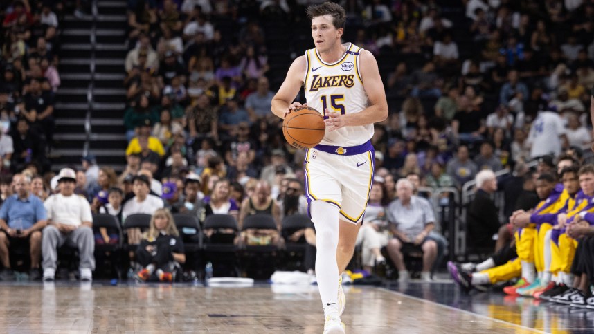 Oct 6, 2024; Palm Desert, California, USA; Los Angeles Lakers guard Austin Reaves (15) moves the ball against the Phoenix Suns during the second half  at Acrisure Arena. Mandatory Credit: David Frerker-Imagn Images