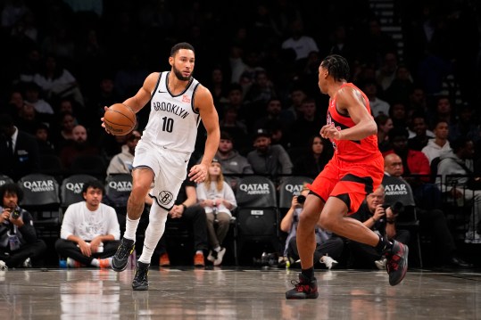 Oct 18, 2024; Brooklyn, New York, USA; Brooklyn Nets point guard Ben Simmons (10) dribbles the ball against Toronto Raptors small forward Scottie Barnes (4) during the first half at Barclays Center. Mandatory Credit: Gregory Fisher-Imagn Images