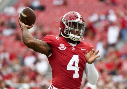 Sep 7, 2024; Tuscaloosa, Alabama, USA; Alabama Crimson Tide quarterback Jalen Milroe (4)(New York Giants prospect) throws during pregame warmups before a game against the South Florida Bulls at Bryant-Denny Stadium. Mandatory Credit: Gary Cosby Jr.-Imagn Images