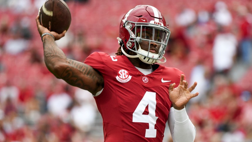 Sep 7, 2024; Tuscaloosa, Alabama, USA; Alabama Crimson Tide quarterback Jalen Milroe (4)(New York Giants prospect) throws during pregame warmups before a game against the South Florida Bulls at Bryant-Denny Stadium. Mandatory Credit: Gary Cosby Jr.-Imagn Images