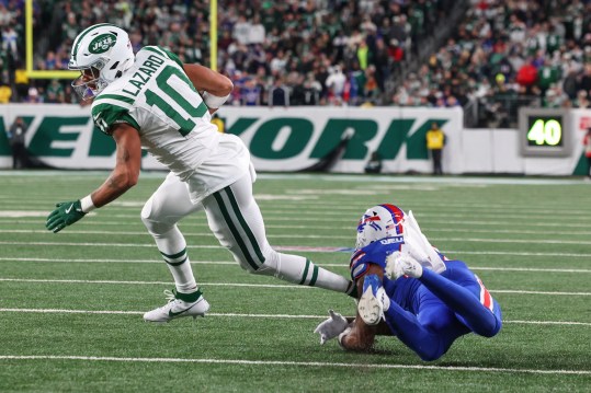 Oct 14, 2024; East Rutherford, New Jersey, USA; New York Jets wide receiver Allen Lazard (10) runs with the ball against the Buffalo Bills during the second half at MetLife Stadium. Mandatory Credit: Ed Mulholland-Imagn Images