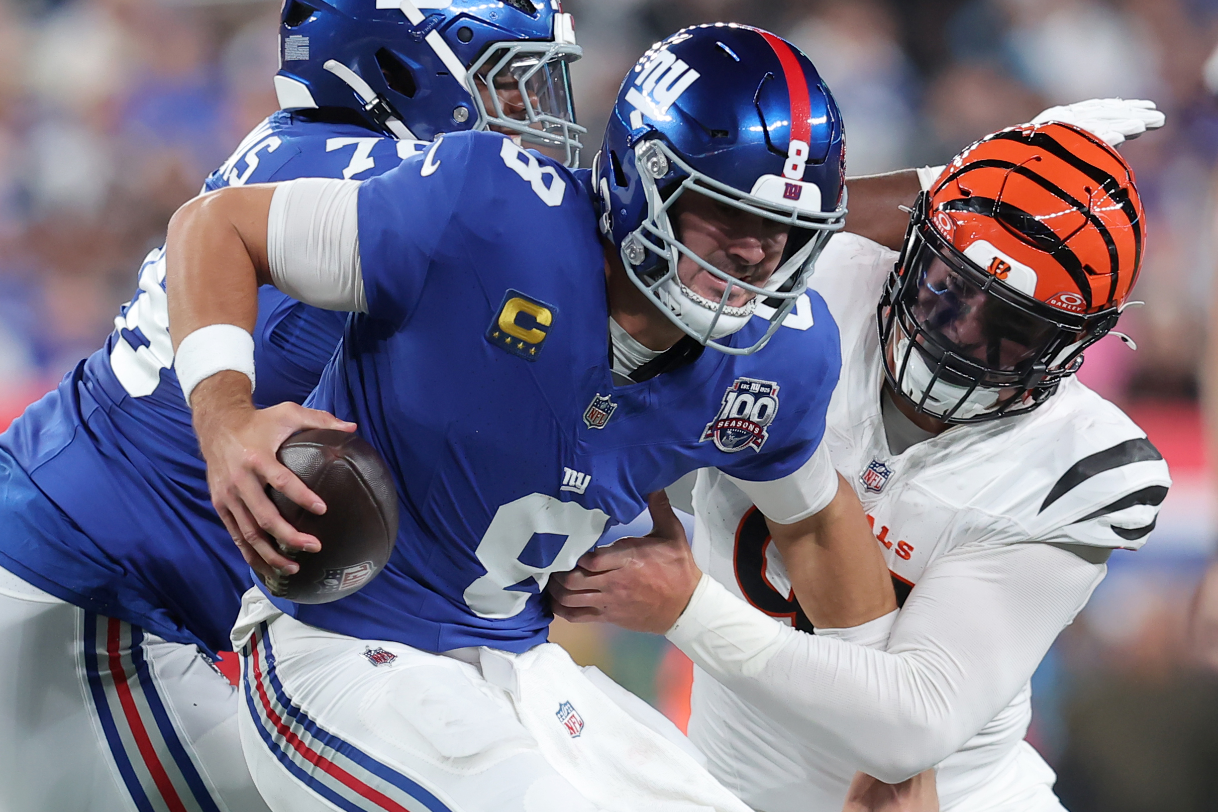 Oct 13, 2024; East Rutherford, New Jersey, USA; Cincinnati Bengals defensive end Trey Hendrickson (91) sacks New York Giants quarterback Daniel Jones (8) during the second quarter at MetLife Stadium. Mandatory Credit: Brad Penner-Imagn Images