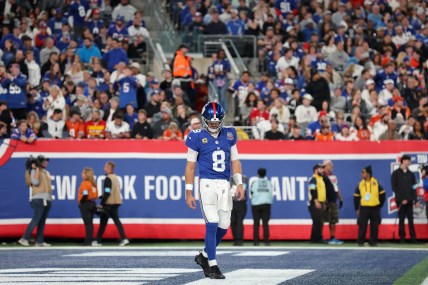 Oct 13, 2024; East Rutherford, New Jersey, USA; New York Giants quarterback Daniel Jones (8) reacts during the second quarter against the Cincinnati Bengals at MetLife Stadium. Mandatory Credit: Brad Penner-Imagn Images