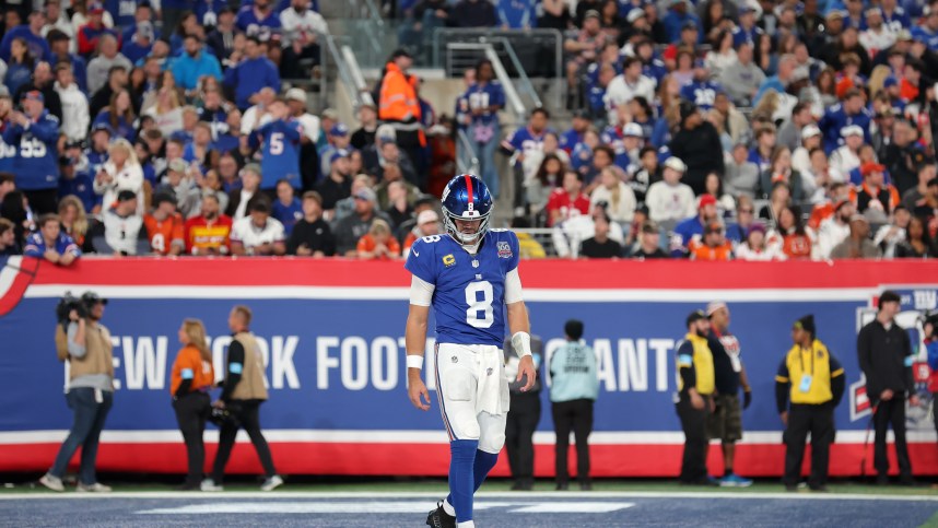 Oct 13, 2024; East Rutherford, New Jersey, USA; New York Giants quarterback Daniel Jones (8) reacts during the second quarter against the Cincinnati Bengals at MetLife Stadium. Mandatory Credit: Brad Penner-Imagn Images