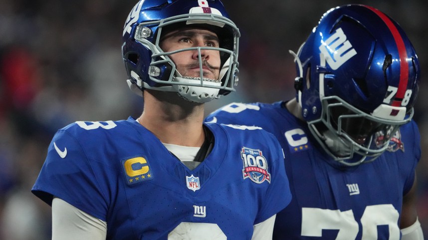 Oct 13, 2024; East Rutherford, New Jersey, USA;  New York Giants quarterback Daniel Jones (8) after a incomplete pass against the Cincinnati Bengals during the second half at MetLife Stadium. Mandatory Credit: Robert Deutsch-Imagn Images