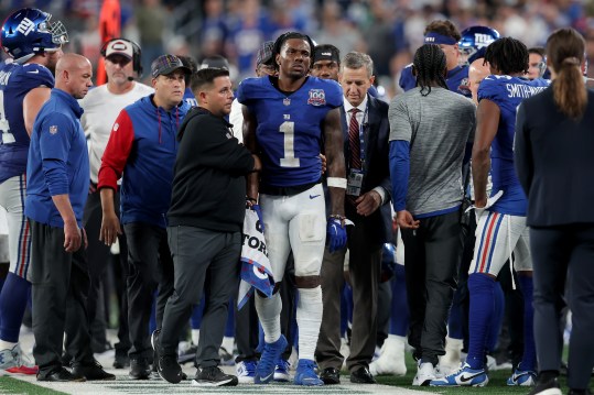 Sep 26, 2024; East Rutherford, New Jersey, USA; New York Giants wide receiver Malik Nabers (1) is helped off the field after an injury during the fourth quarter against the Dallas Cowboys at MetLife Stadium. Mandatory Credit: Brad Penner-Imagn Images