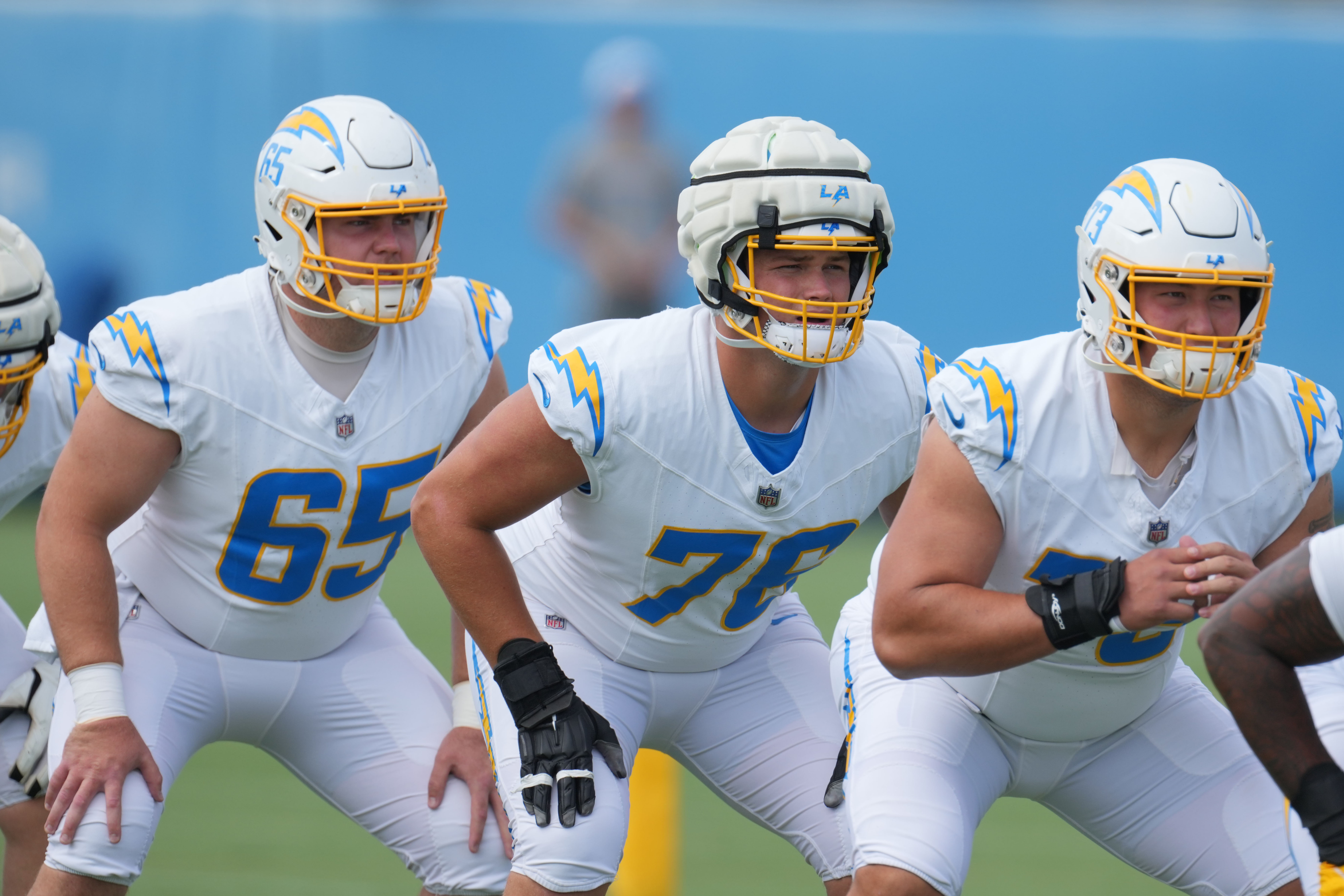 Jun 13, 2024; Costa Mesa, CA, USA; Los Angeles Chargers center Brent Laing (65), offensive tackle Joe Alt (76) and offensive tackle Foster Sarell (73) during minicamp at the Hoag Performance Center. Mandatory Credit: Kirby Lee-Imagn Images