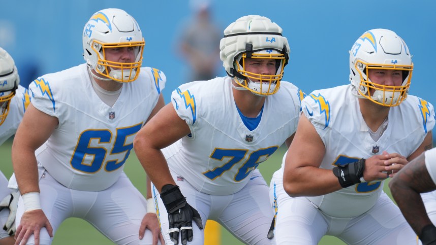 Jun 13, 2024; Costa Mesa, CA, USA; Los Angeles Chargers center Brent Laing (65), offensive tackle Joe Alt (76) and offensive tackle Foster Sarell (73) during minicamp at the Hoag Performance Center. Mandatory Credit: Kirby Lee-Imagn Images