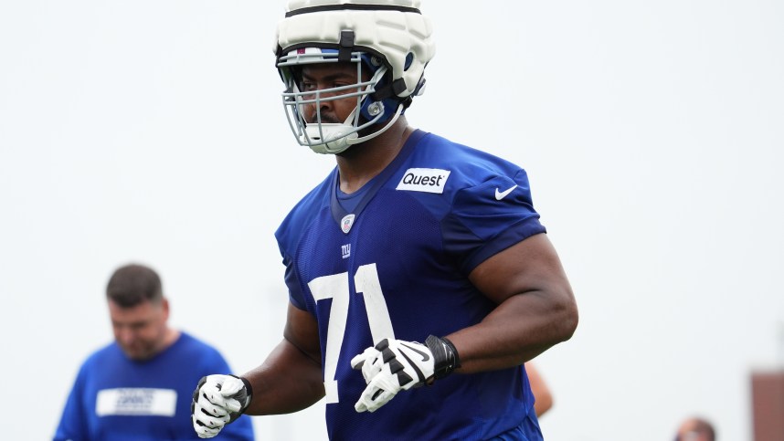 Jul 25, 2024; East Rutherford, NY, USA; New York Giants offensive tackle Marcellus Johnson (71) jogs to the sideline during training camp at Quest Diagnostics Training Center. Mandatory Credit: Lucas Boland-Imagn Images