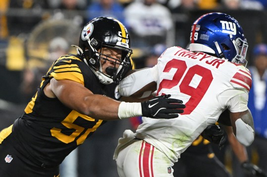 Oct 28, 2024; Pittsburgh, Pennsylvania, USA; Pittsburgh Steelers linebacker Alex Highsmith (56) tackles New York Giants running back Tyrone Tracy Jr. (29) during the second quarter at Acrisure Stadium. Mandatory Credit: Barry Reeger-Imagn Images