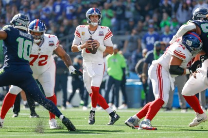 Oct 6, 2024; Seattle, Washington, USA; New York Giants quarterback Daniel Jones (8) looks to pass against the Seattle Seahawks during the first quarter at Lumen Field. Mandatory Credit: Joe Nicholson-Imagn Images