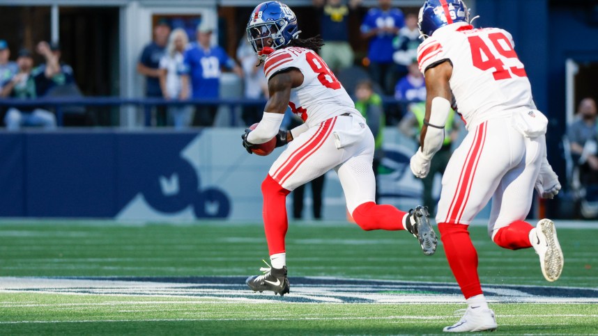 Oct 6, 2024; Seattle, Washington, USA; New York Giants wide receiver Bryce Ford-Wheaton (88) returns a blocked field goal for a touchdown against the Seattle Seahawks during the fourth quarter at Lumen Field. Mandatory Credit: Joe Nicholson-Imagn Images