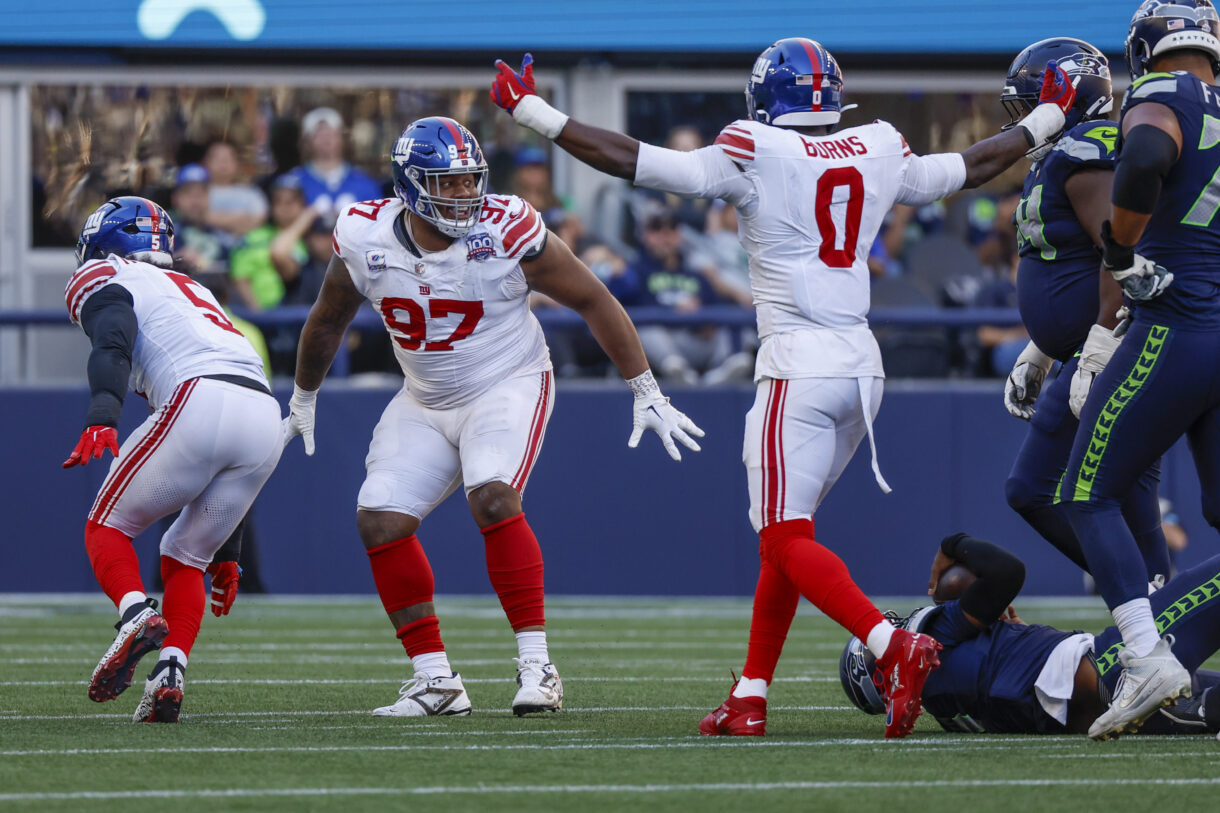 Oct 6, 2024; Seattle, Washington, USA; New York Giants defensive tackle Dexter Lawrence II (97) celebrates following a fourth down sack against the Seattle Seahawks during the fourth quarter at Lumen Field. Mandatory Credit: Joe Nicholson-Imagn Images