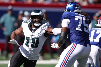 Oct 20, 2024; East Rutherford, New Jersey, USA; Philadelphia Eagles linebacker Josh Sweat (19) pass rushes against the New York Giants New York Giants guard Joshua Ezeudu (75) during the first half at MetLife Stadium. Mandatory Credit: Vincent Carchietta-Imagn Images