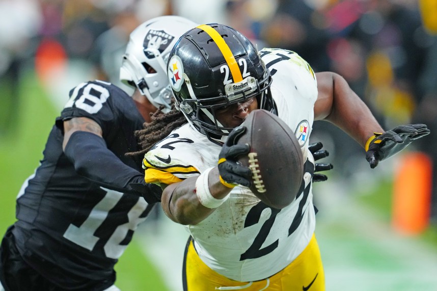 Oct 13, 2024; Paradise, Nevada, USA; Pittsburgh Steelers running back Najee Harris (22) is pushed out of bounds by Las Vegas Raiders cornerback Jack Jones (18) during the third quarter at Allegiant Stadium. Mandatory Credit: Stephen R. Sylvanie-Imagn Images