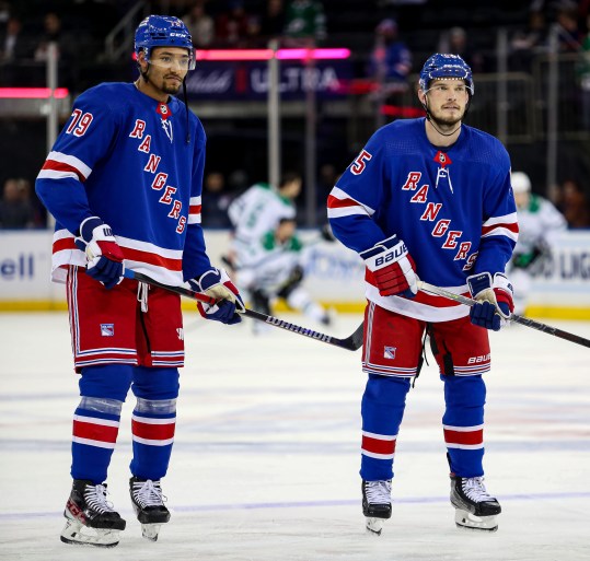 Jan 12, 2023; New York, New York, USA; New York Rangers defenseman K'Andre Miller (79) and New York Rangers defenseman Ryan Lindgren (55) during warmups before a game against the Dallas Stars at Madison Square Garden. Mandatory Credit: Danny Wild-Imagn Images