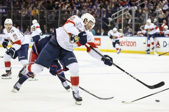 Oct 24, 2024; New York, New York, USA;  Florida Panthers center Carter Verhaeghe (23) attempts a shot on goal in the third period against the New York Rangers at Madison Square Garden. Mandatory Credit: Wendell Cruz-Imagn Images