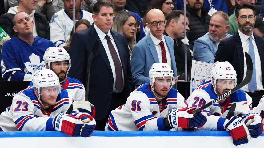 Oct 19, 2024; Toronto, Ontario, CAN; New York Rangers head coach Peter Laviolette watches the play against the Toronto Maple Leafs during the third period at Scotiabank Arena. Mandatory Credit: Nick Turchiaro-Imagn Images