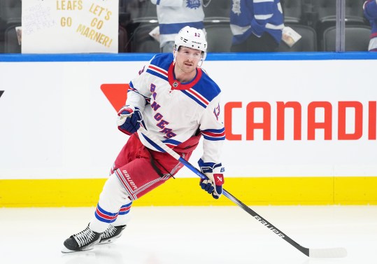 Oct 19, 2024; Toronto, Ontario, CAN; New York Rangers left wing Alexis Lafreniere (13) skates during the warmup before a game against the Toronto Maple Leafs at Scotiabank Arena. Mandatory Credit: Nick Turchiaro-Imagn Images