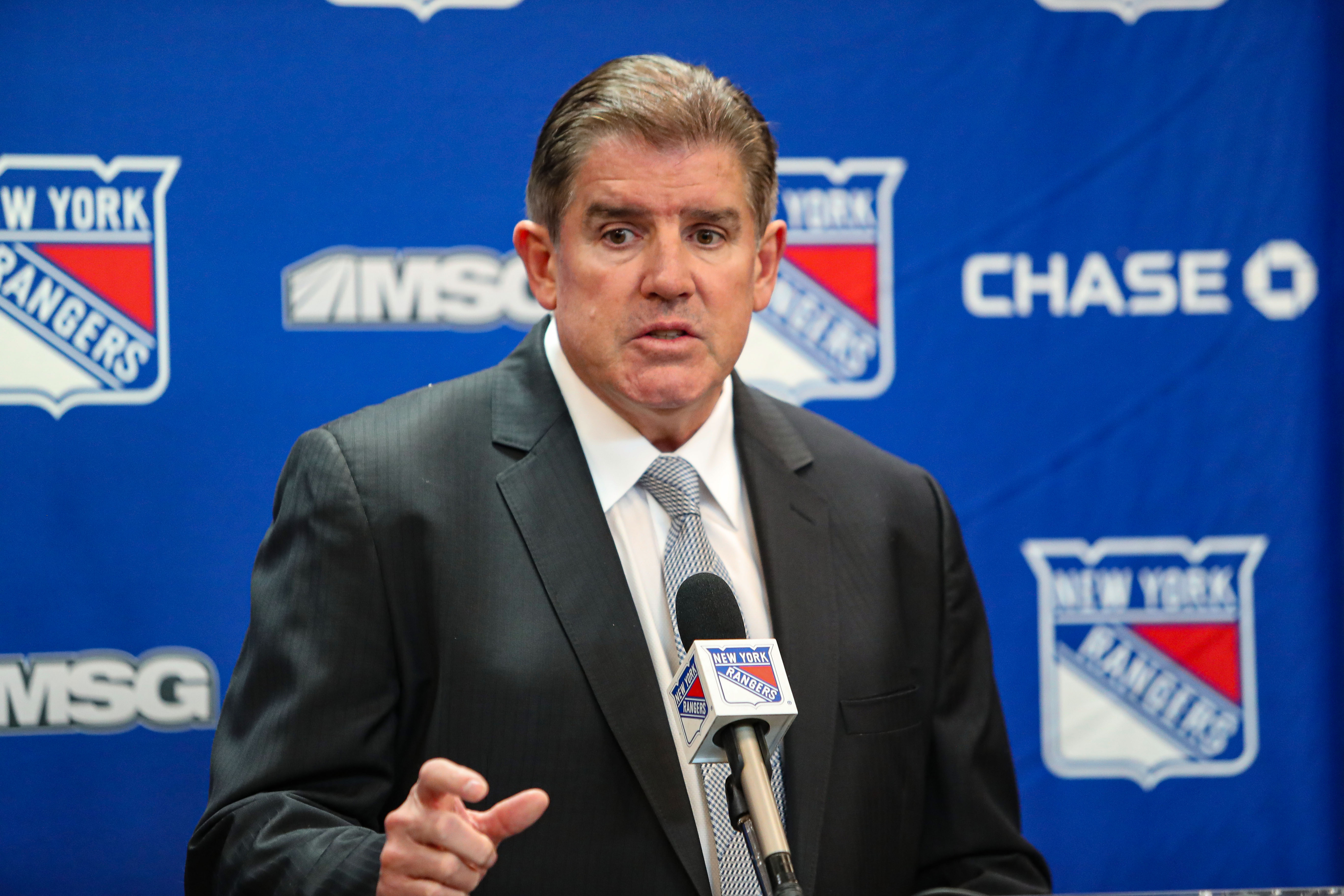 Sep 24, 2024; New York, New York, USA; New York Rangers head coach Peter Laviolette speaks to reporters after a 6-4 win against the New York Islanders in the preseason home opener at Madison Square Garden. Mandatory Credit: Danny Wild-Imagn Images