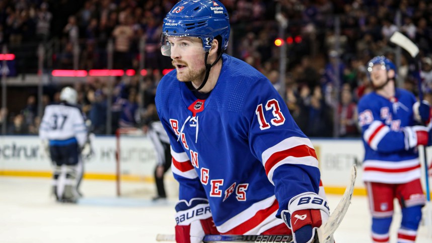 Mar 19, 2024; New York, New York, USA; New York Rangers forward Alexis Lafreniere (13) celebrates his goal during the third period against the Winnipeg Jets at Madison Square Garden. Mandatory Credit: Danny Wild-Imagn Images