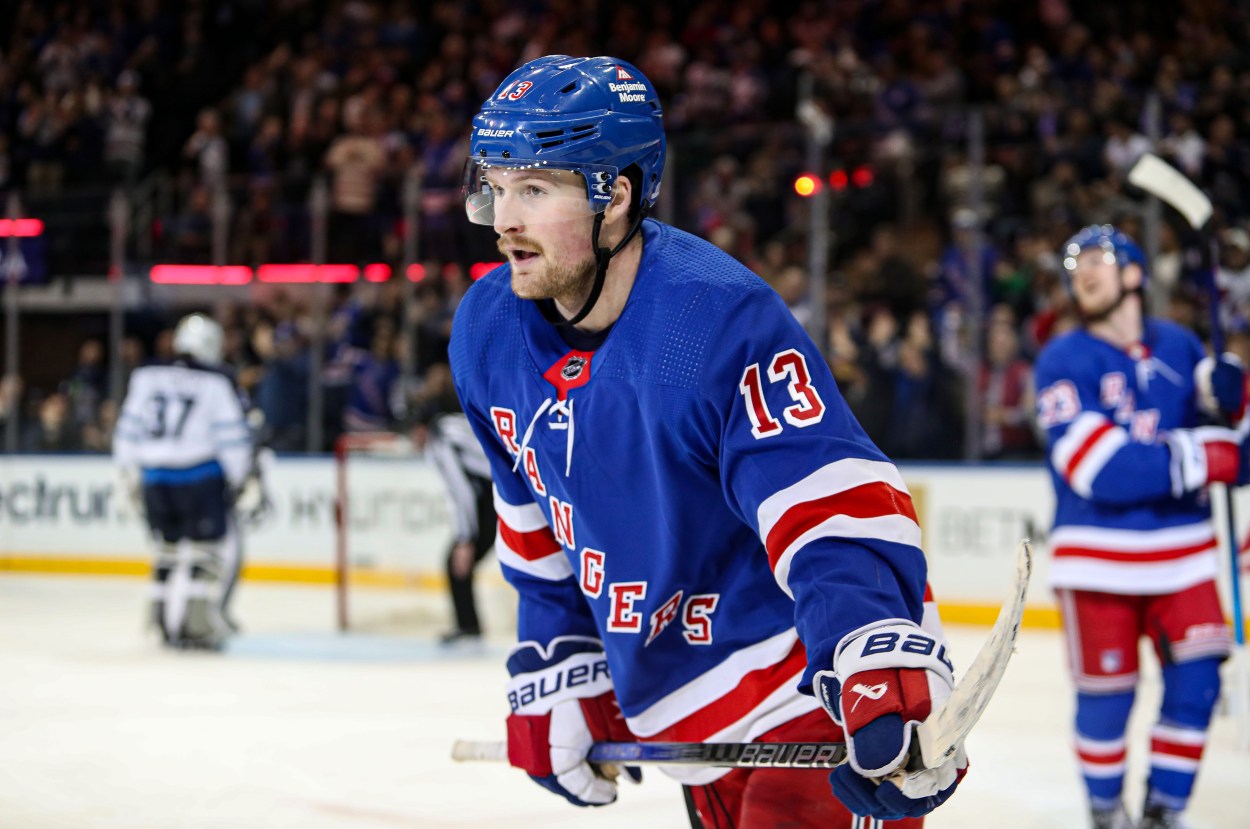 Mar 19, 2024; New York, New York, USA; New York Rangers forward Alexis Lafreniere (13) celebrates his goal during the third period against the Winnipeg Jets at Madison Square Garden. Mandatory Credit: Danny Wild-Imagn Images