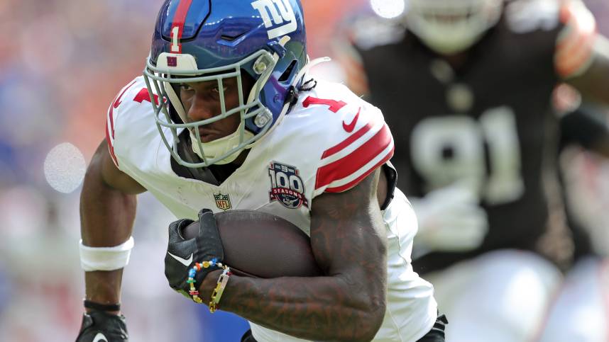 New York Giants wide receiver Malik Nabers (1) runs for yards after a catch during the first half of an NFL football game at Huntington Bank Field, Sunday, Sept. 22, 2024, in Cleveland, Ohio.