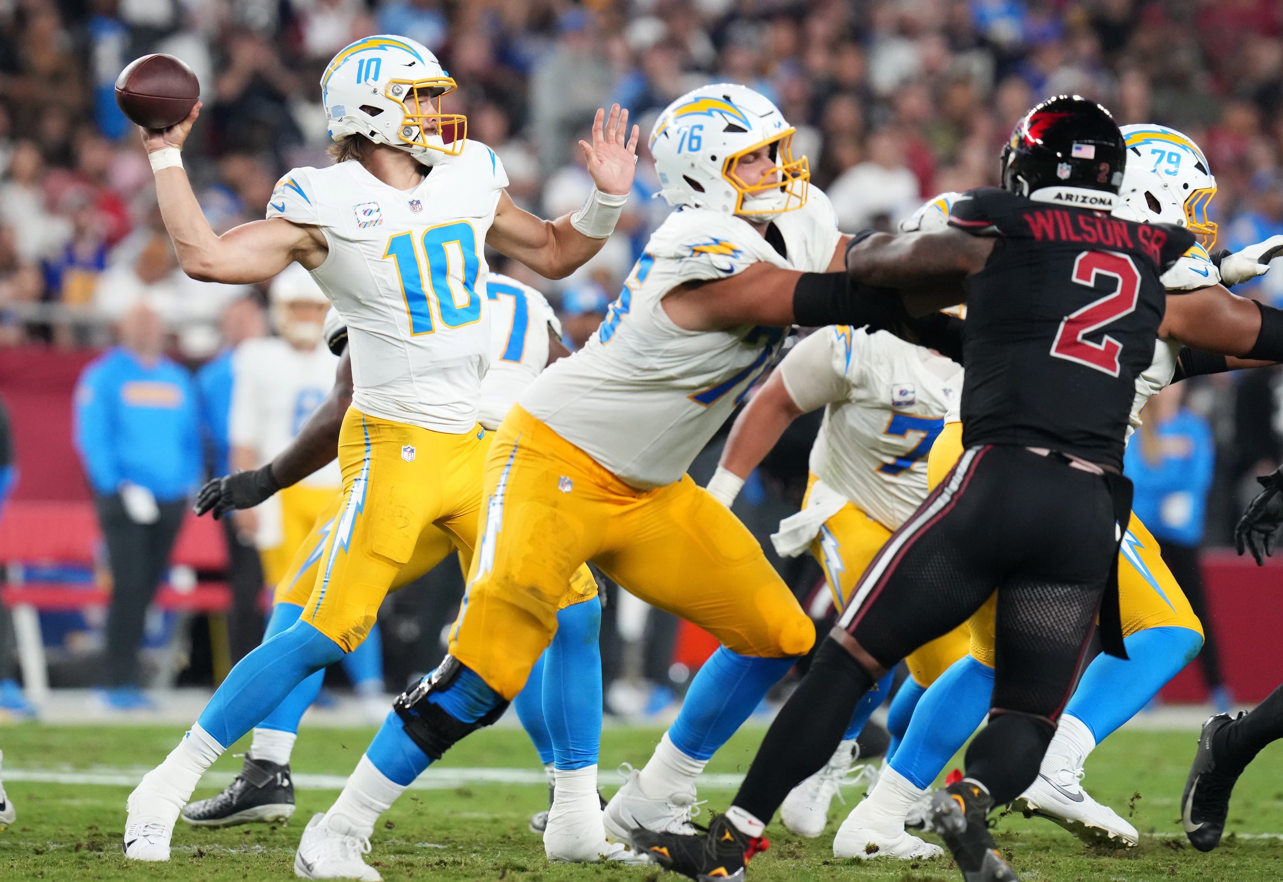 Los Angeles Chargers quarterback Justin Herbert (10) throws the ball against the Arizona Cardinals at State Farm Stadium in Glendale on Oct. 21, 2024.