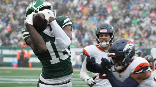 East Rutherford, NJ -- September 29 -- Mike Williams of the Jets made this catch in the first half as the Denver Broncos edged the New York Jets 10-9 at MetLife Stadium.