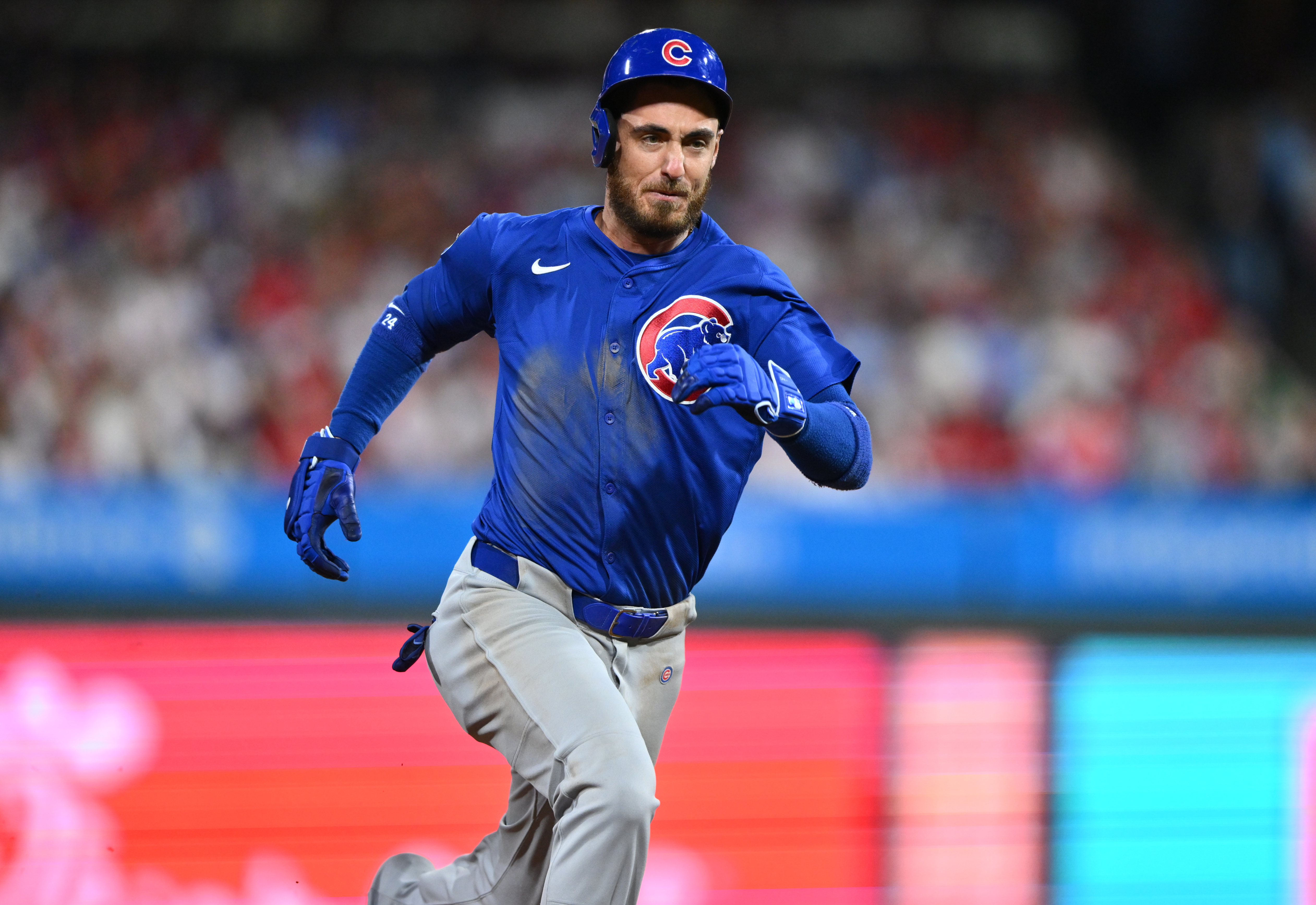 Sep 24, 2024; Philadelphia, Pennsylvania, USA; Chicago Cubs outfielder Cody Bellinger (24) runs to third after hitting an RBI triple against the Philadelphia Phillies in the sixth inning at Citizens Bank Park. Mandatory Credit: Kyle Ross-Imagn Images