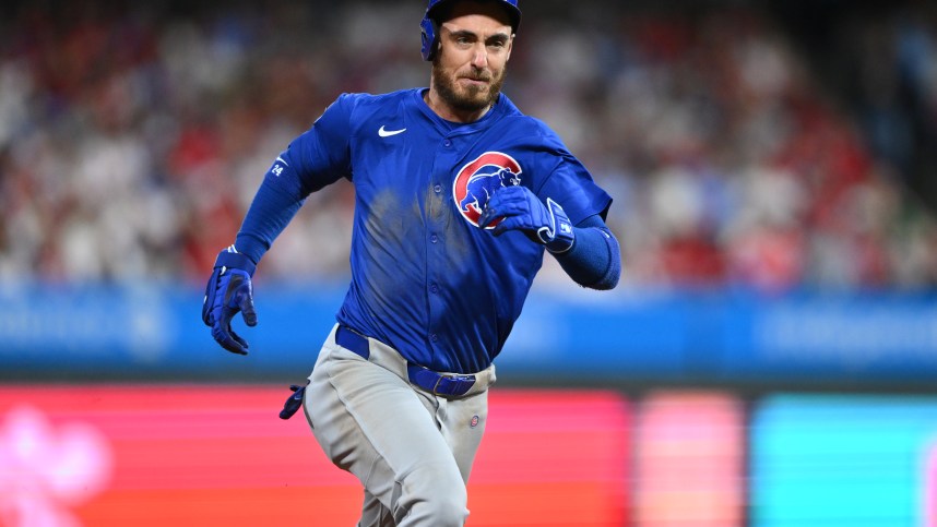 Sep 24, 2024; Philadelphia, Pennsylvania, USA; Chicago Cubs outfielder Cody Bellinger (24) runs to third after hitting an RBI triple against the Philadelphia Phillies in the sixth inning at Citizens Bank Park. Mandatory Credit: Kyle Ross-Imagn Images