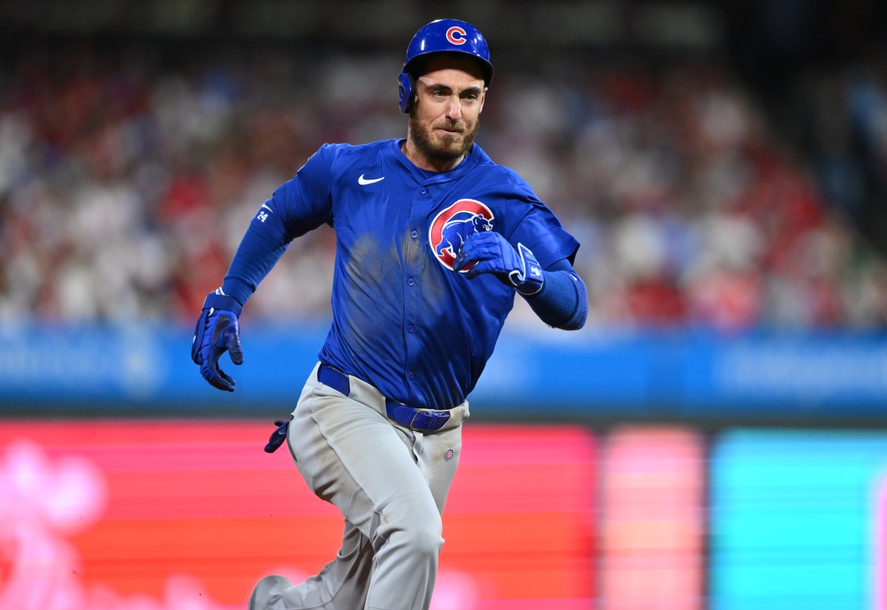 Sep 24, 2024; Philadelphia, Pennsylvania, USA; Chicago Cubs outfielder Cody Bellinger (24) runs to third after hitting an RBI triple against the Philadelphia Phillies in the sixth inning at Citizens Bank Park. Mandatory Credit: Kyle Ross-Imagn Images