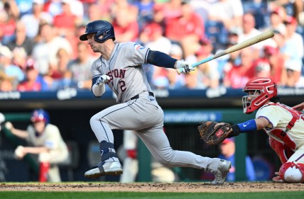 Aug 28, 2024; Philadelphia, Pennsylvania, USA; Houston Astros infielder Alex Bregman (2) hits a single against the Philadelphia Phillies in the third inning at Citizens Bank Park. Mandatory Credit: Kyle Ross-Imagn Images