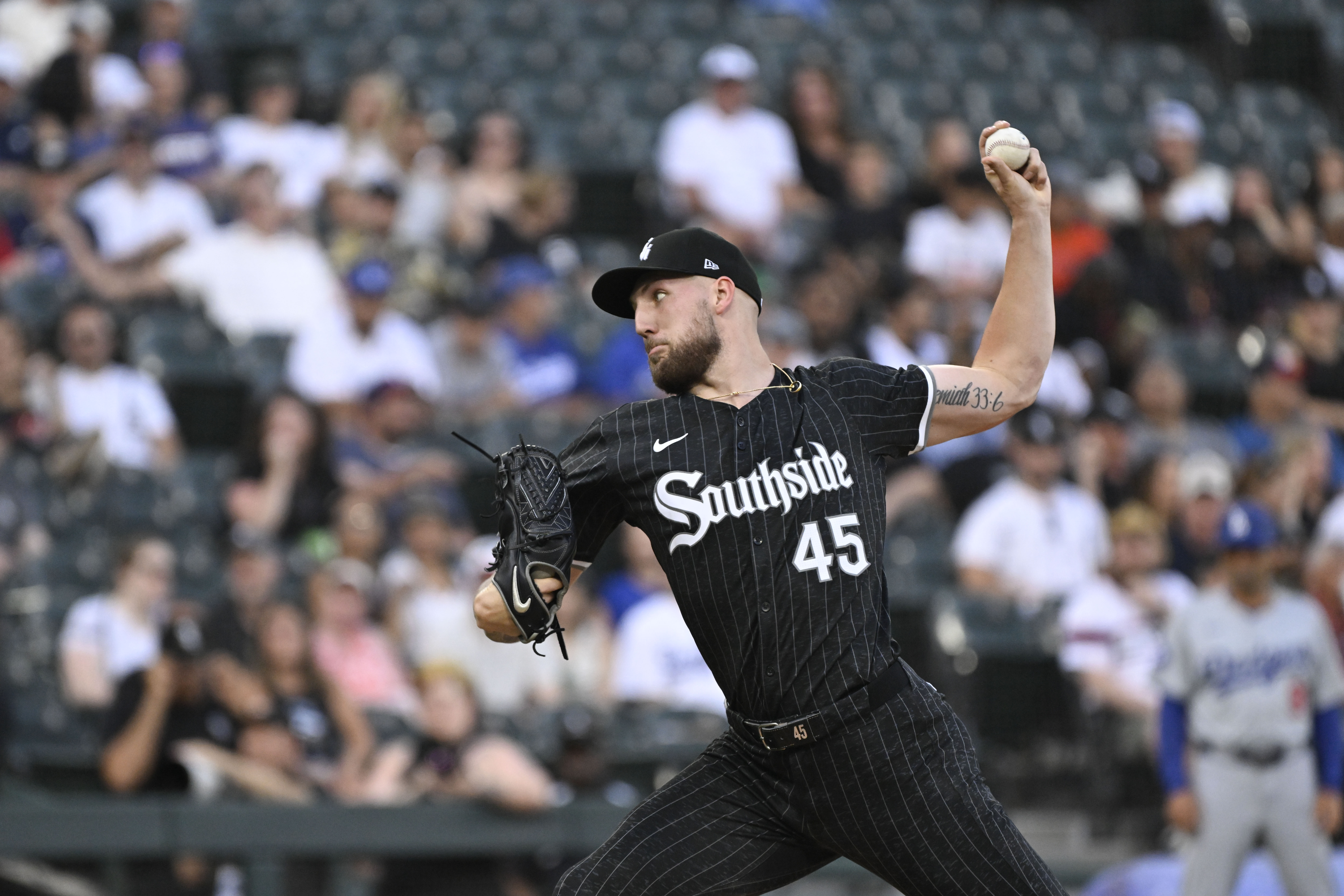 Jun 24, 2024; Chicago, Illinois, USA;  Chicago White Sox pitcher Garrett Crochet (45) delivers against the Los Angeles Dodgers during the first inning at Guaranteed Rate Field. Mandatory Credit: Matt Marton-Imagn Images