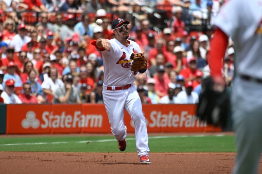 Jul 2, 2023; St. Louis, Missouri, USA; St. Louis Cardinals third baseman Nolan Arenado (28) throws to first for an out against the New York Yankees in the first inning at Busch Stadium. Mandatory Credit: Joe Puetz-Imagn Images