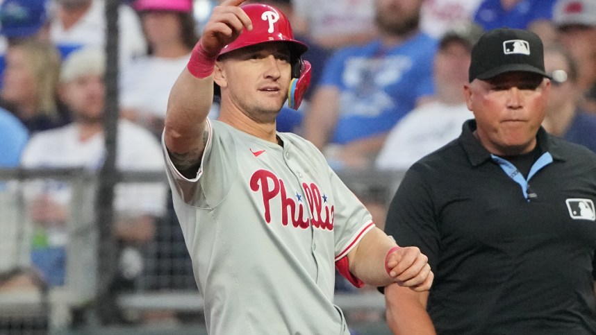 Aug 23, 2024; Kansas City, Missouri, USA; Philadelphia Phillies left fielder Austin Hays (9) celebrates after hitting a single against the Kansas City Royals in the third inning at Kauffman Stadium. Mandatory Credit: Denny Medley-Imagn Images