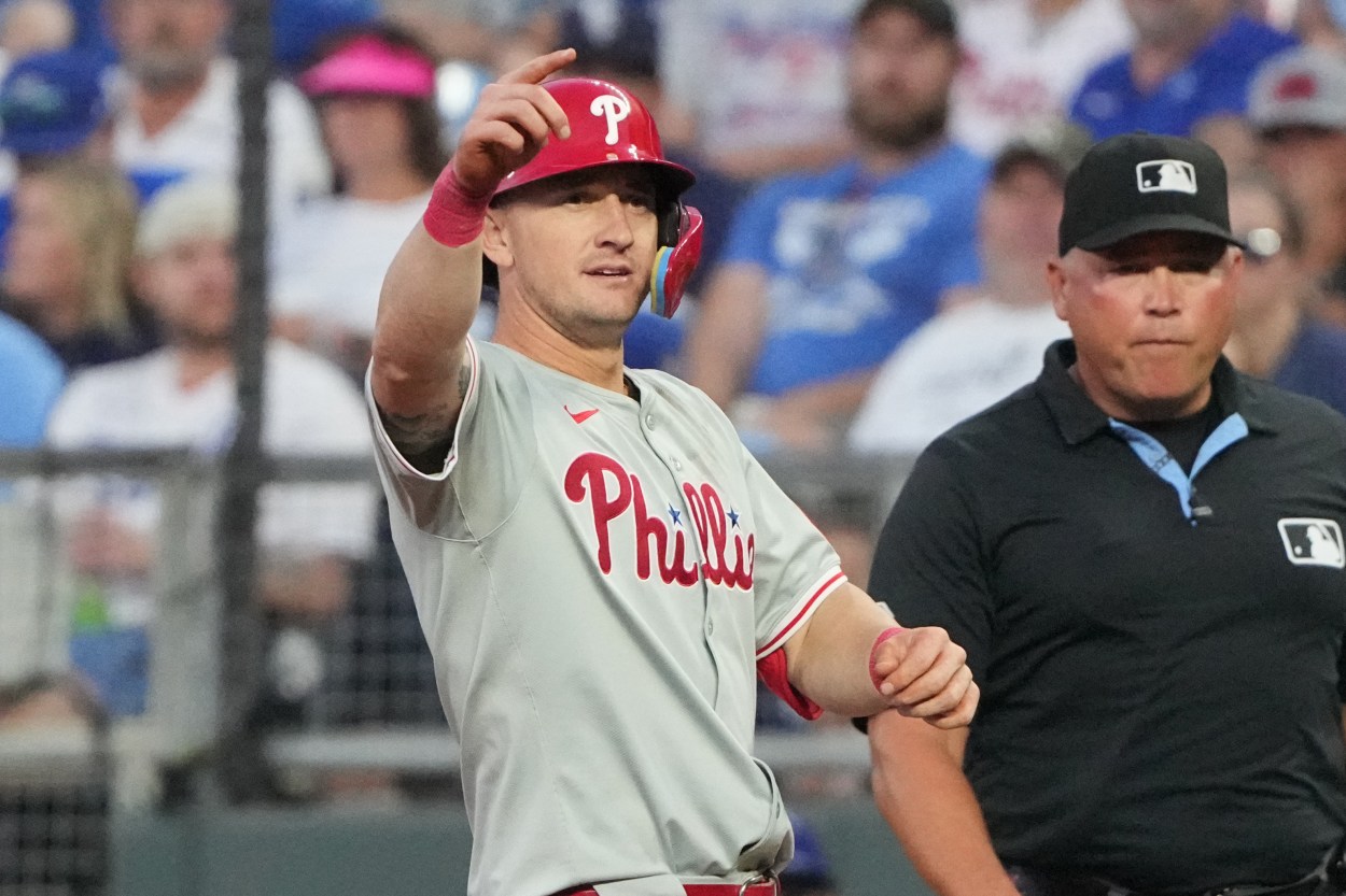 Aug 23, 2024; Kansas City, Missouri, USA; Philadelphia Phillies left fielder Austin Hays (9) celebrates after hitting a single against the Kansas City Royals in the third inning at Kauffman Stadium. Mandatory Credit: Denny Medley-Imagn Images