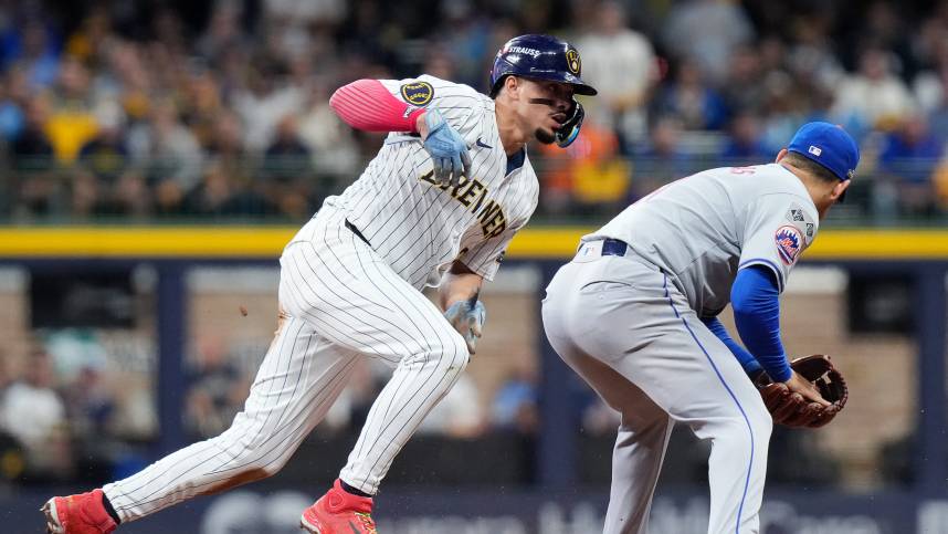 Oct 3, 2024; Milwaukee, Wisconsin, USA; Milwaukee Brewers shortstop Willy Adames (27) steals second during the fourth inning of Game 3 of National League wild-card series against New York Mets on Thursday October 3, 2024 at American Family Field in Milwaukee, Wis. Mandatory Credit: Jovanny Hernandez/USA TODAY Network via Imagn Images