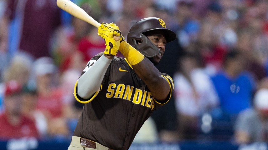 Jun 18, 2024; Philadelphia, Pennsylvania, USA; San Diego Padres outfielder Jurickson Profar (10) hits an RBI single during the sixth inning against the Philadelphia Phillies at Citizens Bank Park. Mandatory Credit: Bill Streicher-Imagn Images