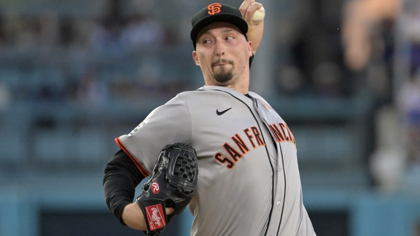 Jul 22, 2024; Los Angeles, California, USA;  San Francisco Giants starting pitcher Blake Snell (7) delivers to the plate in the second inning against the Los Angeles Dodgers at Dodger Stadium. Mandatory Credit: Jayne Kamin-Oncea-Imagn Images