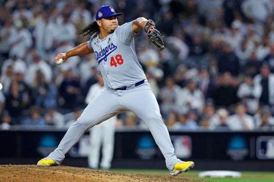 Oct 30, 2024; New York, New York, USA; Los Angeles Dodgers pitcher Brusdar Graterol (48) pitches during the sixth inning against the New York Yankees in game four of the 2024 MLB World Series at Yankee Stadium. Mandatory Credit: Brad Penner-Imagn Images