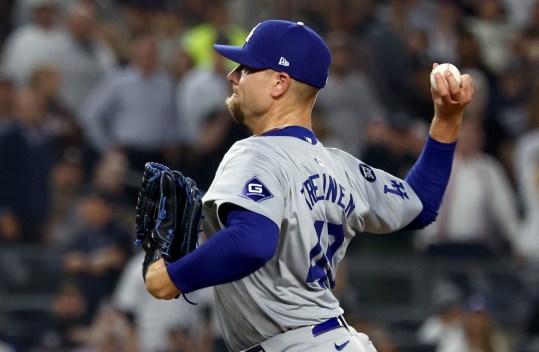 Oct 30, 2024; New York, New York, USA; Los Angeles Dodgers pitcher Blake Treinen (49) throws during the eighth inning against the New York Yankees in game five of the 2024 MLB World Series at Yankee Stadium. Mandatory Credit: Vincent Carchietta-Imagn Images