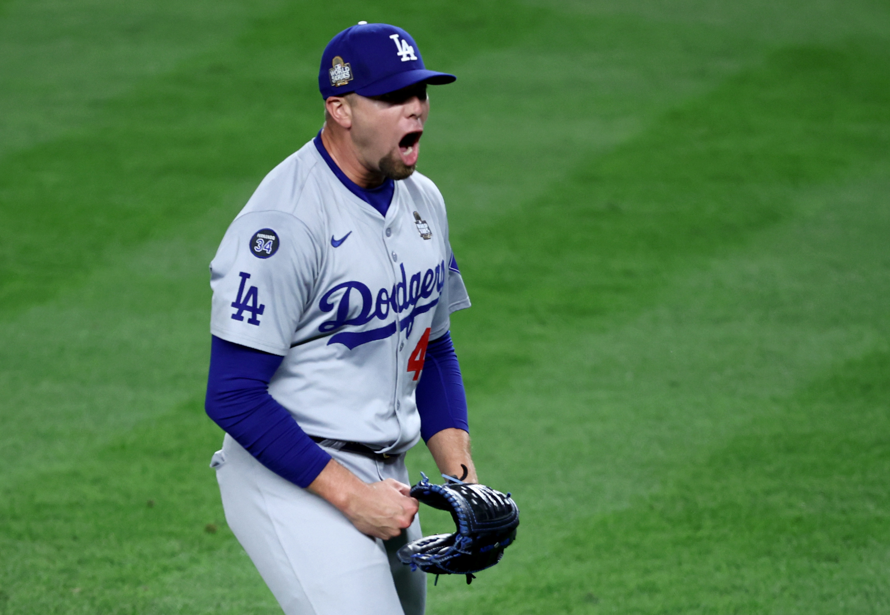 Oct 30, 2024; New York, New York, USA; Los Angeles Dodgers pitcher Blake Treinen (49) celebrates after the end of the eighth inning against the New York Yankees in game five of the 2024 MLB World Series at Yankee Stadium. Mandatory Credit: Wendell Cruz-Imagn Images